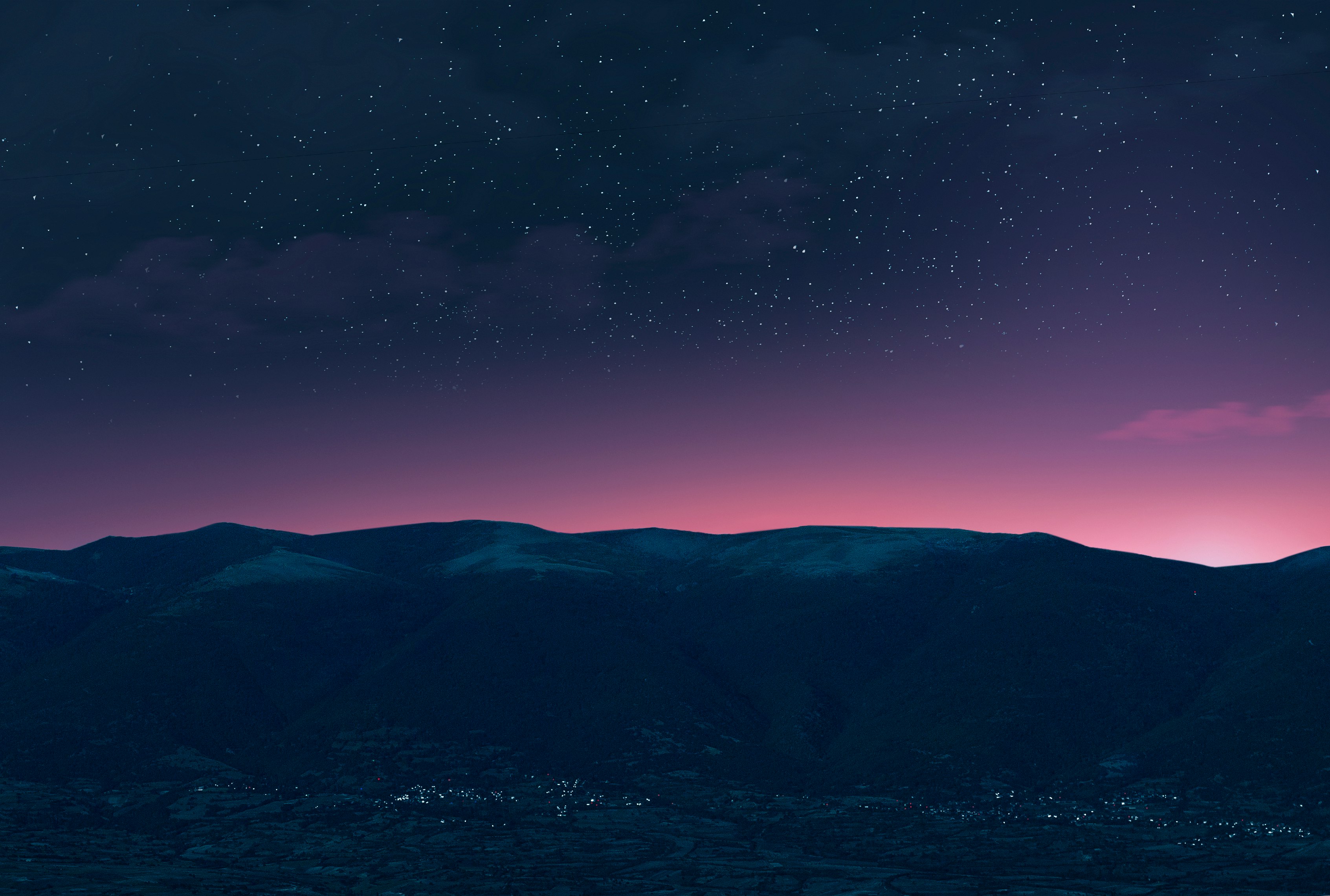 silhouette of mountain under blue sky during night time